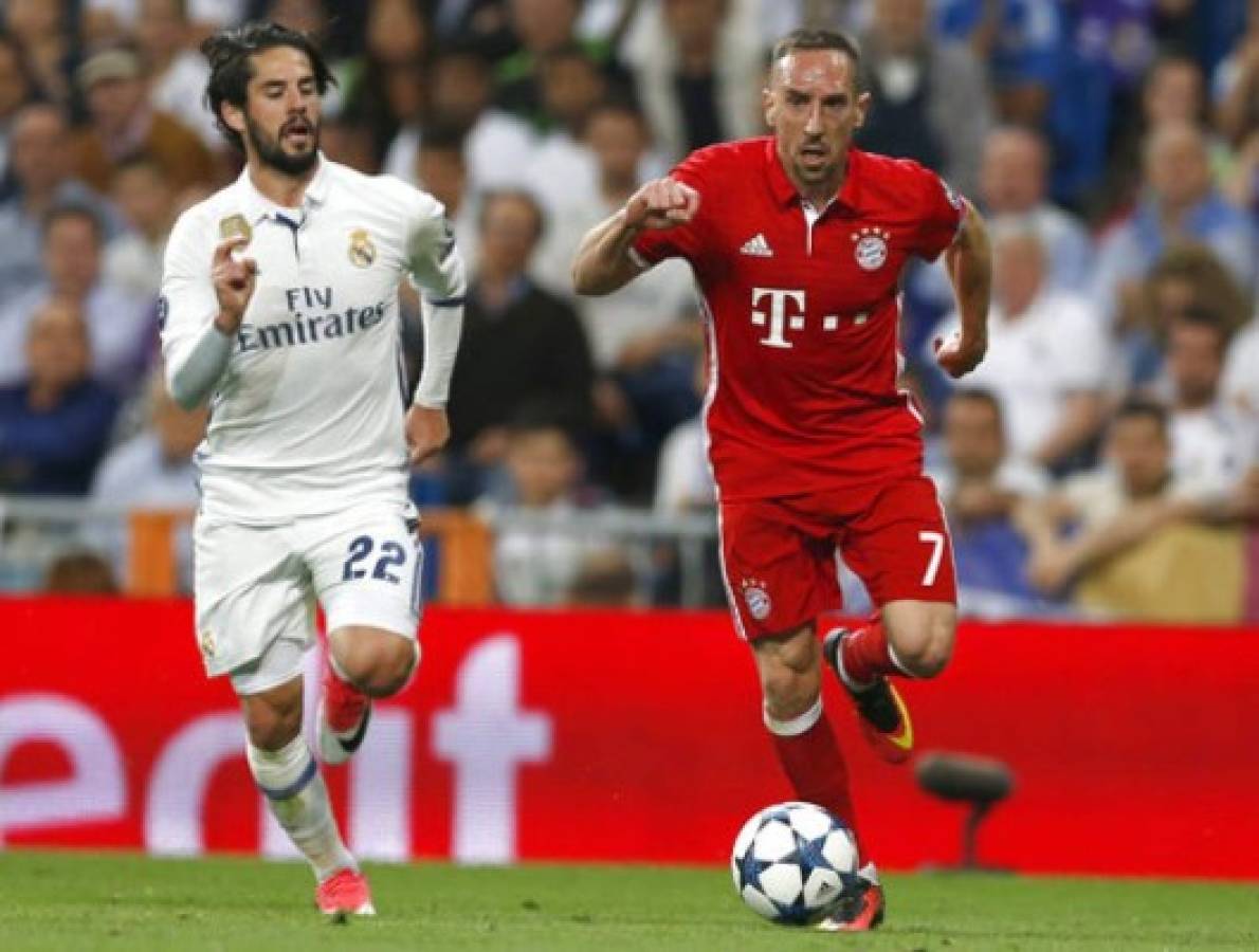 Isco ante Ribéry en el duelo de Champions League en el Santiago Bernabéu (Fotos: Agencias /AP/AFP)