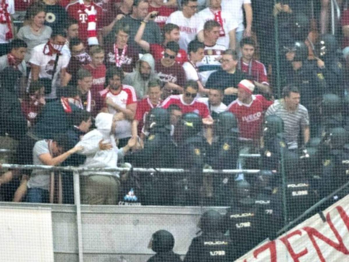 Aficionados del Bayern arman disturbios con la policía de Madrid en el Bernabéu