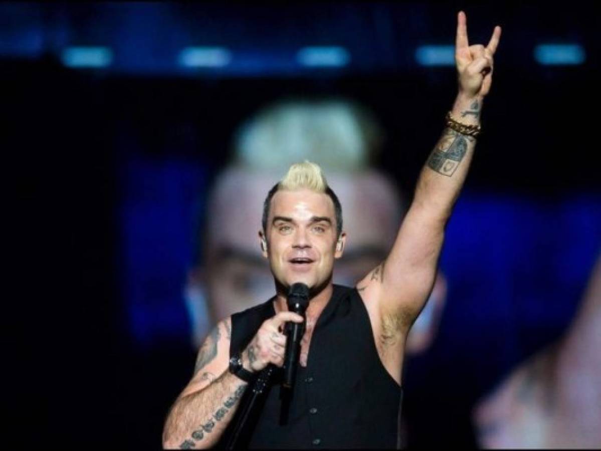 Obsesión de Robbie Williams con OVNIs lo obliga a tener guardaespaldas 24 horas al día