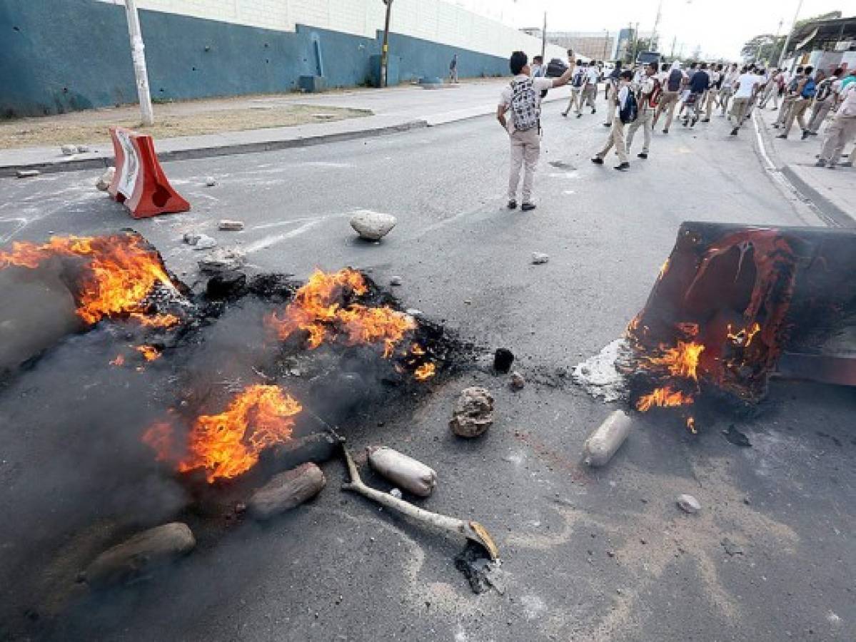 Honduras: Sitiada la Kennedy por actos vandálicos de estudiantes