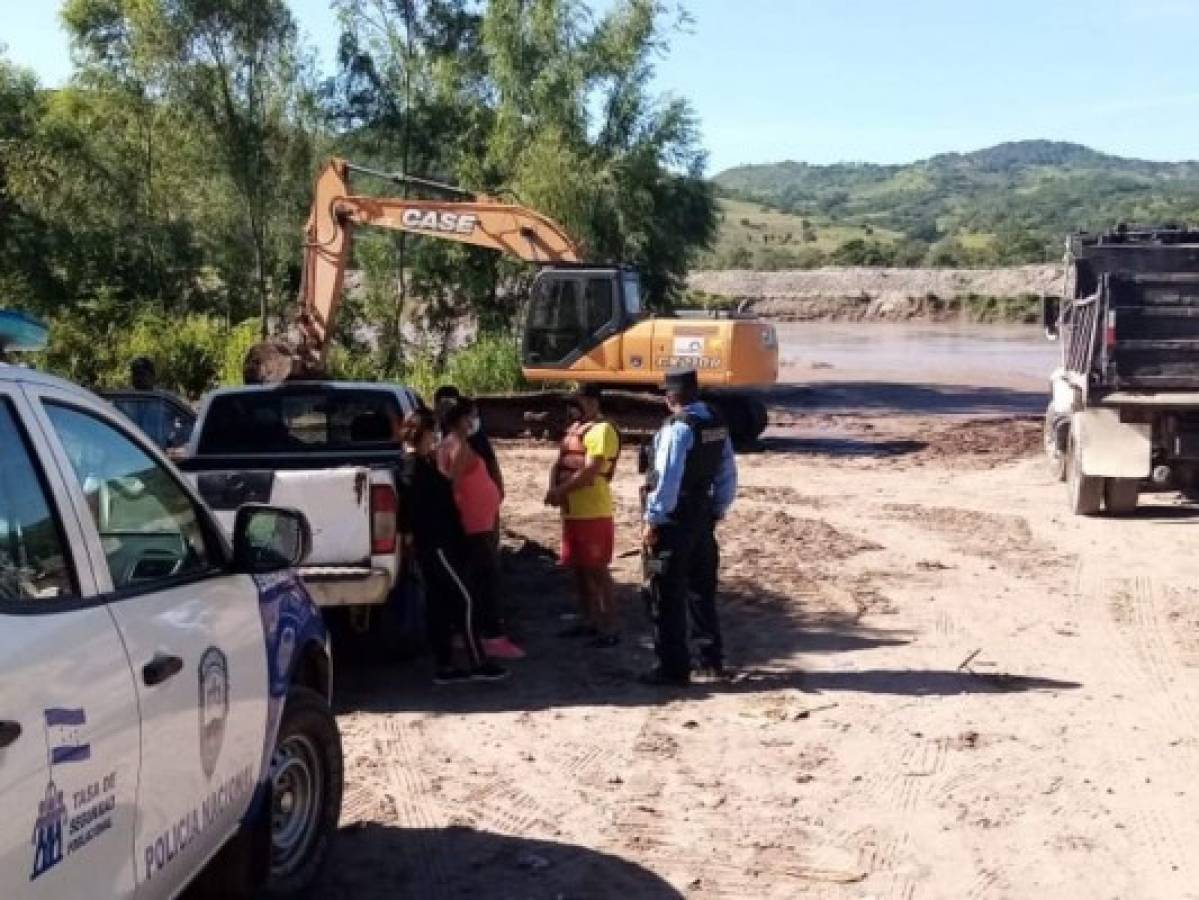 Desesperada búsqueda del cuerpo de menor ahogado en el río Ulúa