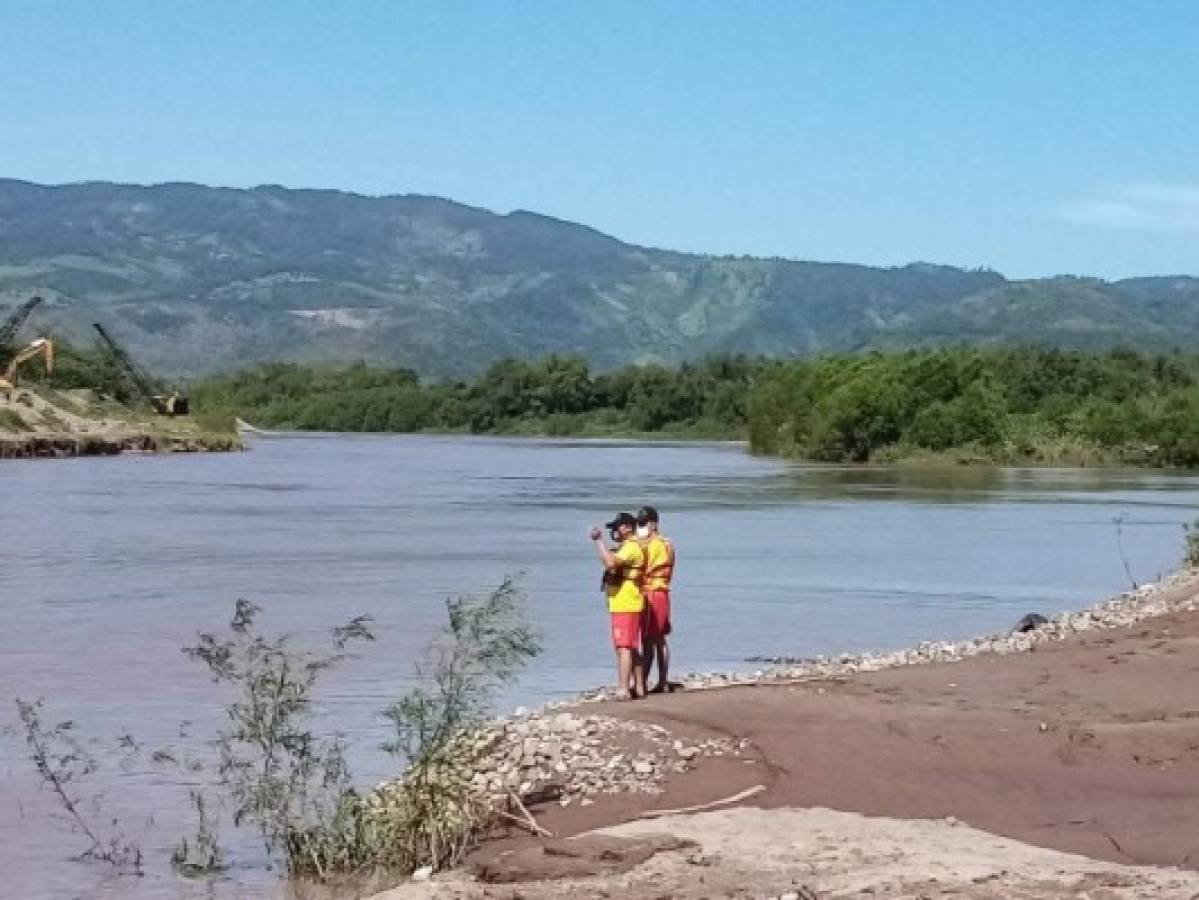 Desesperada búsqueda del cuerpo de menor ahogado en el río Ulúa