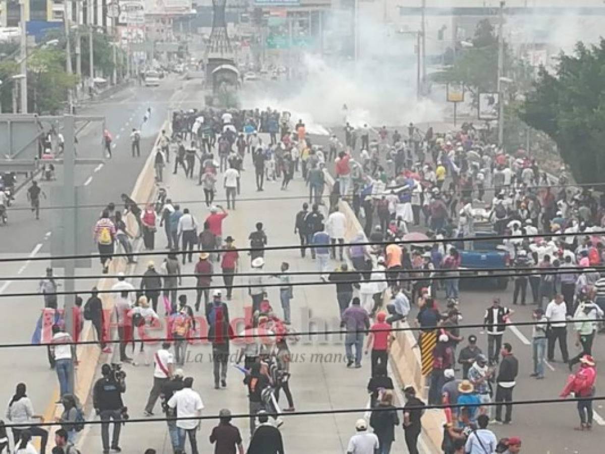 Enfrentamientos entre policías y encapuchados en nueva jornada de protestas