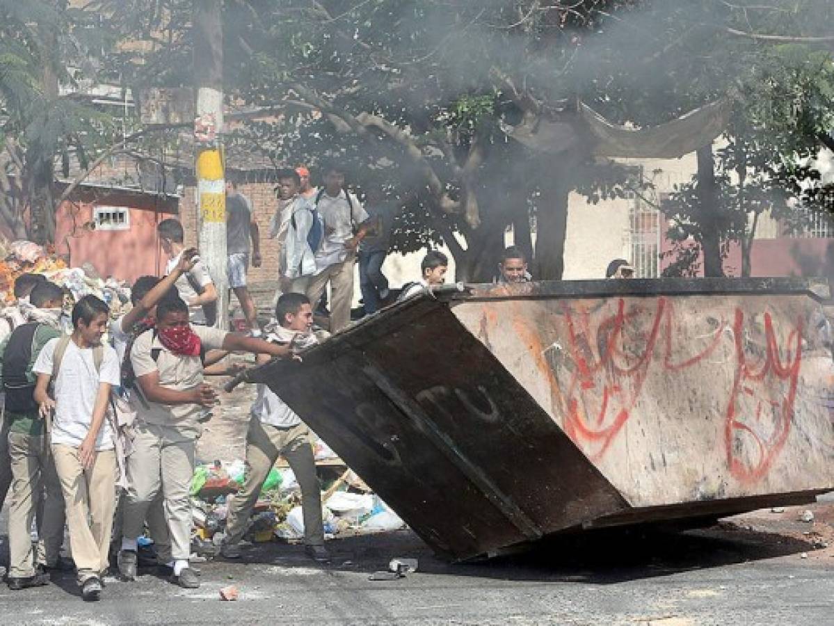 Honduras: Sitiada la Kennedy por actos vandálicos de estudiantes