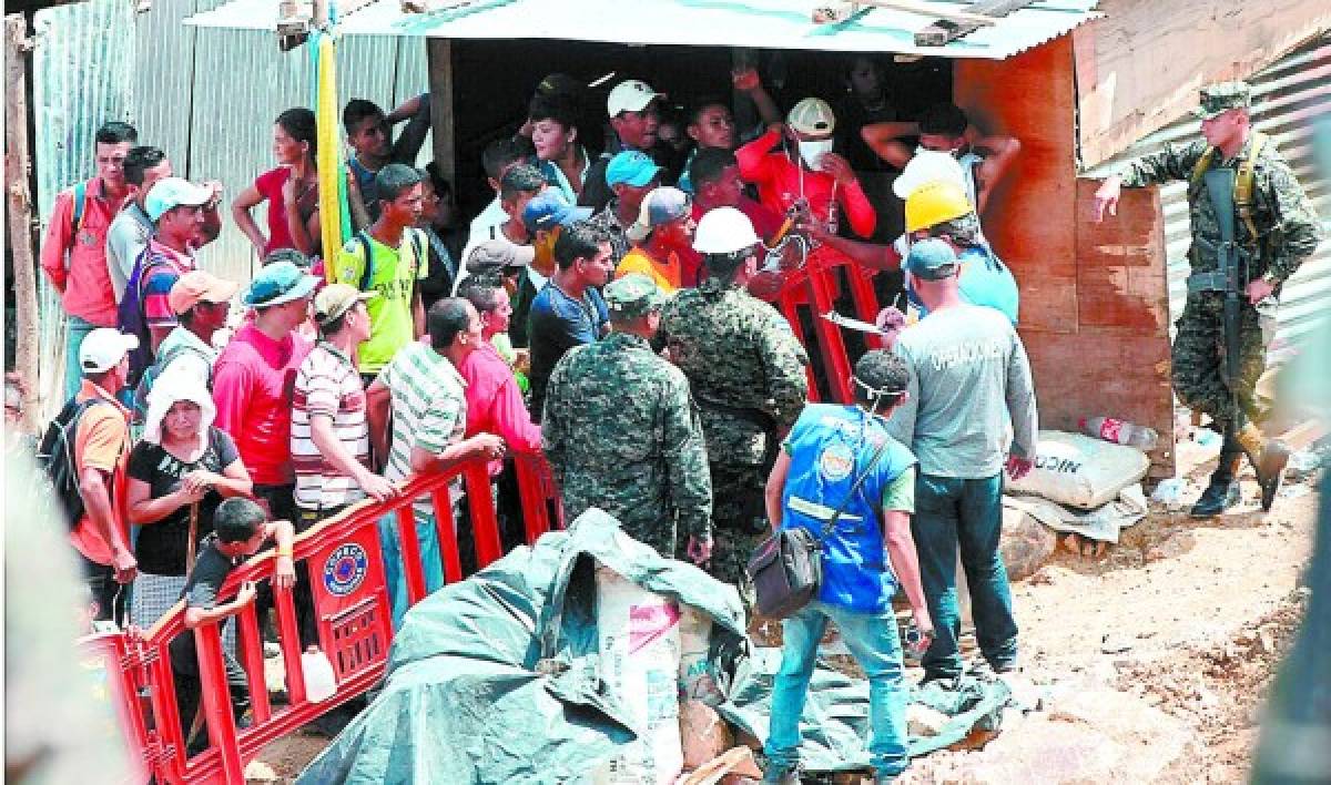 Reanudan labores de búsqueda de los mineros atrapados en El Corpus