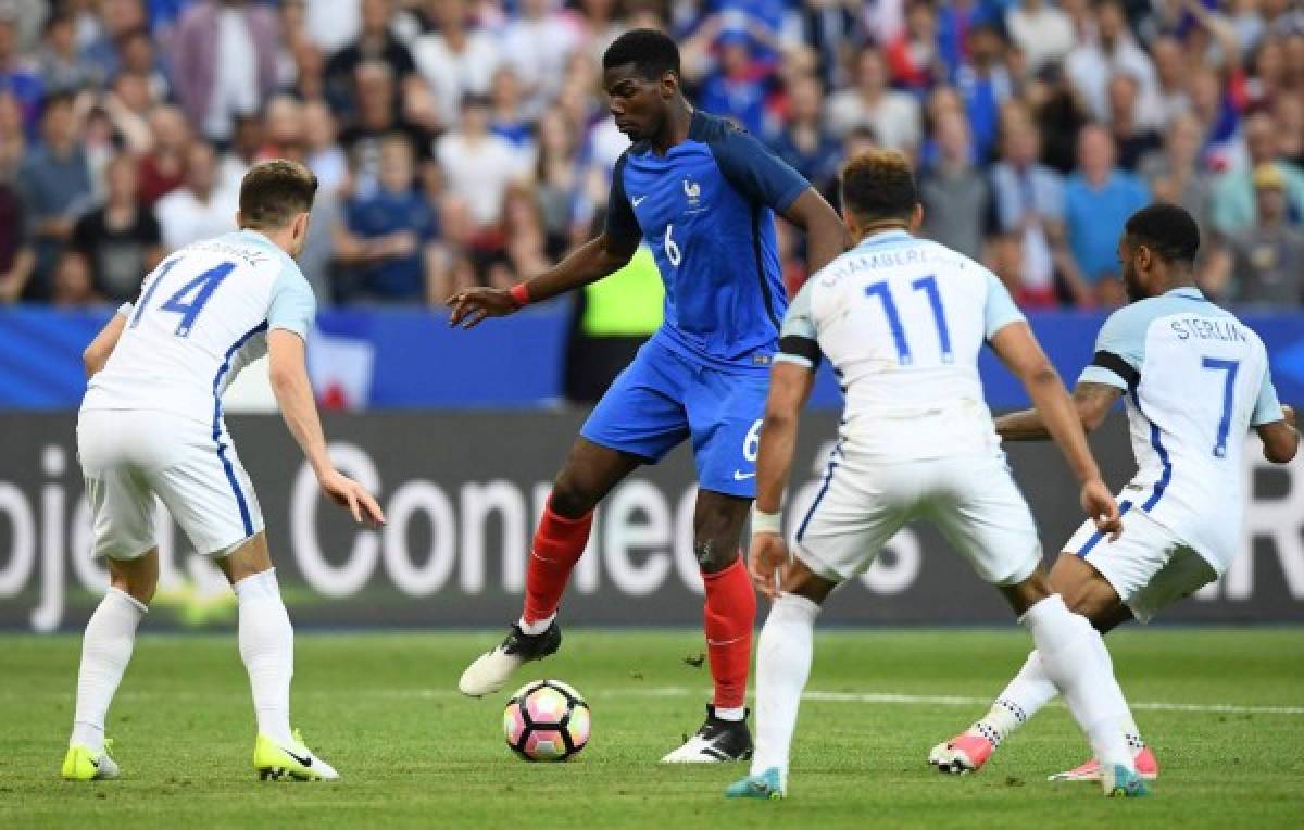 Francia gana a Inglaterra 3-2 en partido marcado por homenaje a víctimas