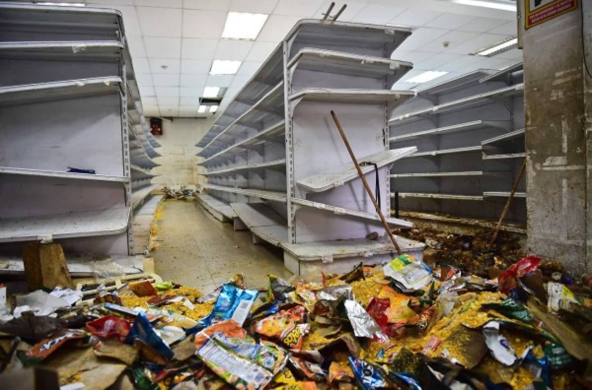 Una vista de un supermercado saqueado en Venezuela debido a la crisis, foto: AFP.