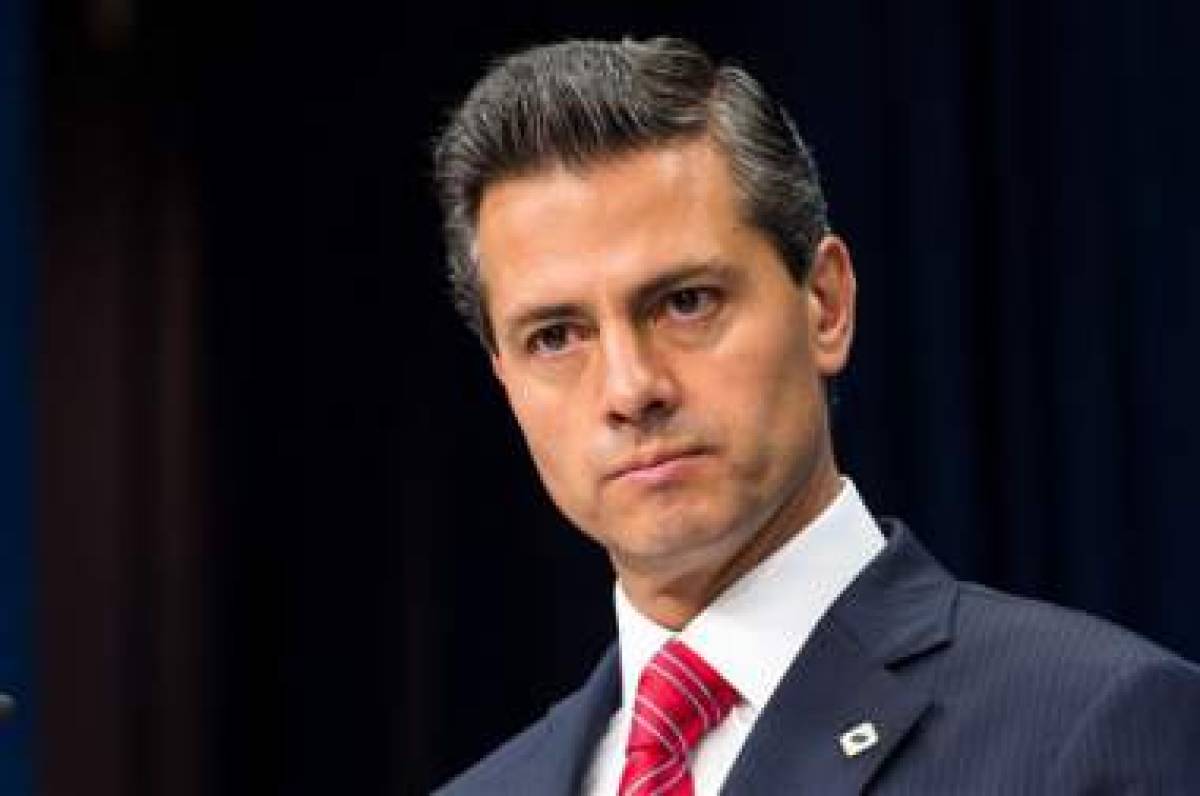 FILE - In this June 12, 2015 file photo, Mexico's President Enrique Pena Nieto addresses the media during an EU Mexico summit at the EU Council building in Brussels, Belgium. Pena Nieto has undergone gallbladder surgery after suffering discomfort early Friday, June 26, 2015. (AP Photo/Geert Vanden Wijngaert, File)