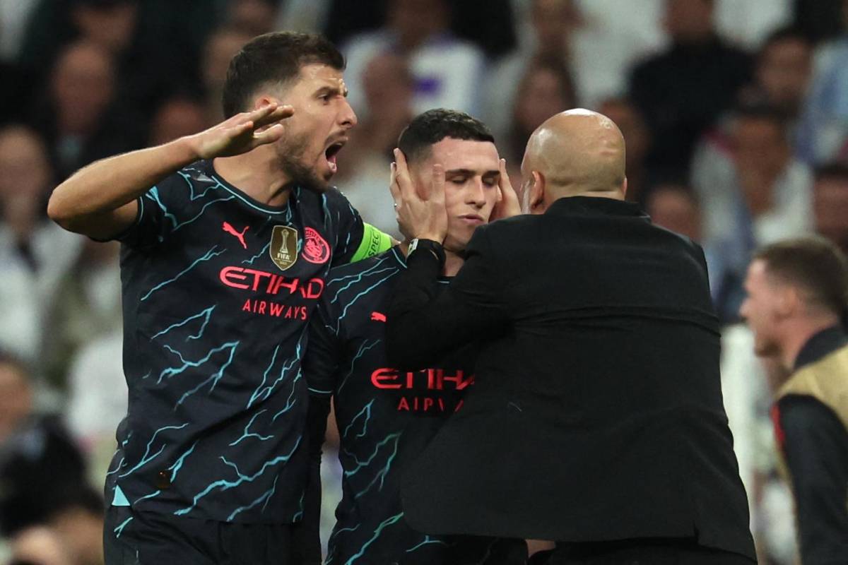 Celebración de Foden con Pep Guardiola y Rubén Dias.