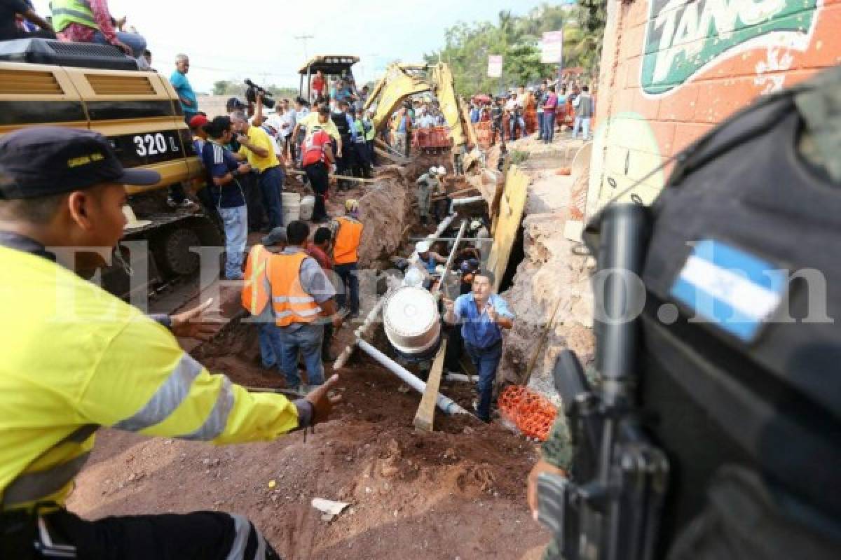 Hallan muertos a los dos obreros soterrados por alud de tierra en la capital de Honduras