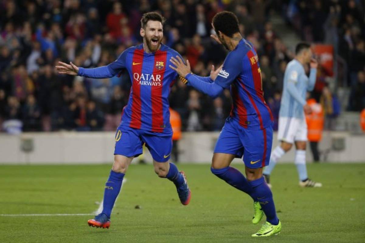 Barcelona's Lionel Messi, left, celebrates with teammate Neymar after scoring the opening goal against Celta during a Spanish La Liga soccer match between Barcelona and Celta at the Camp Nou stadium in Barcelona, Saturday, March 4, 2017. (AP Photo/Francisco Seco)