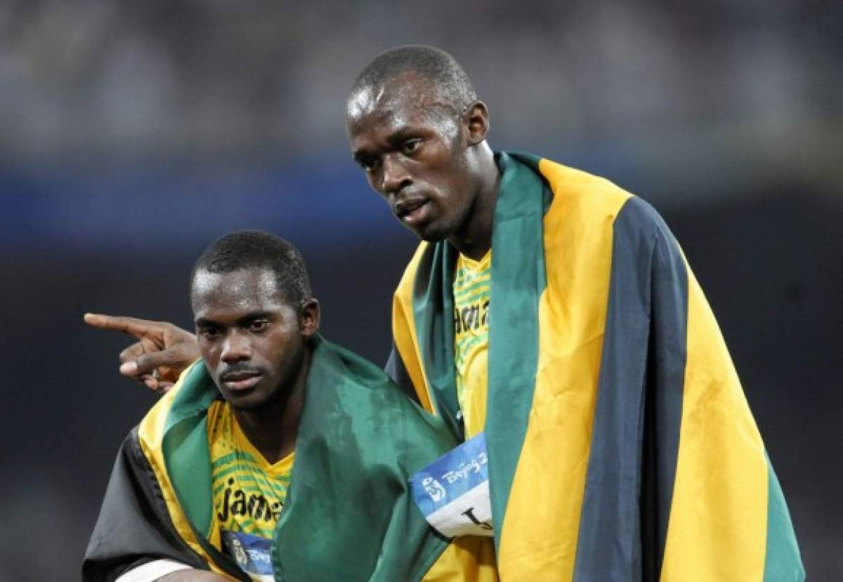 Bolt pierde un oro olímpico por descalificación del relevo de Pekín-2008