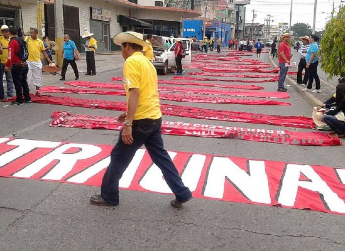 La marcha de los trabajadores hondureños en fotos