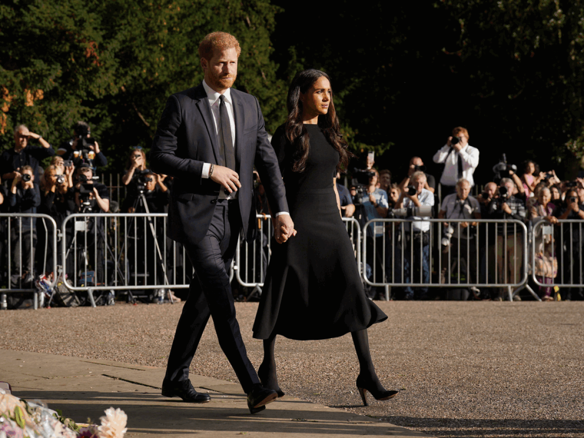 Harry junto a su esposa Meghan.