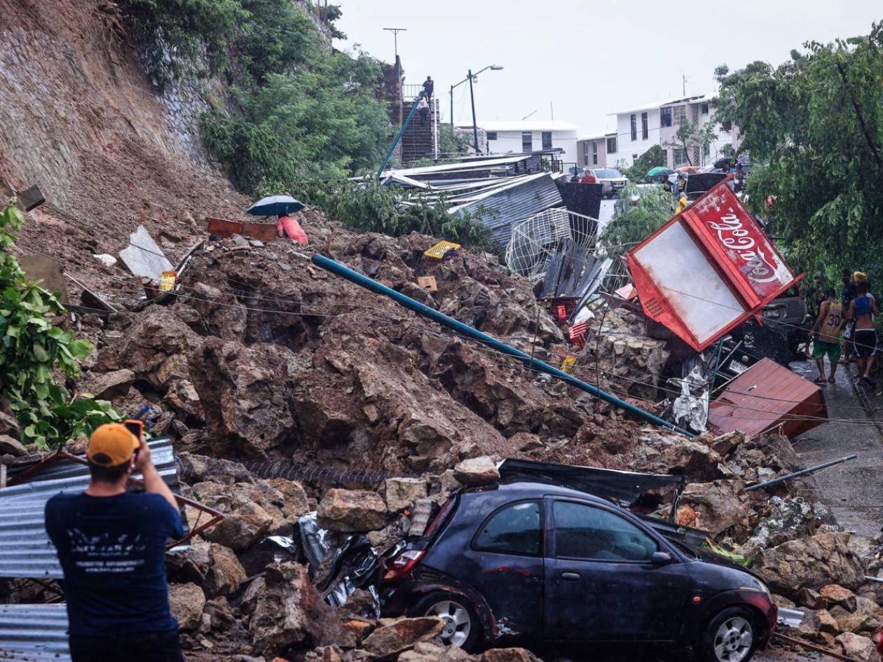 Huracán John deja 22 muertos en sur de México, tras inundaciones y derrumbes