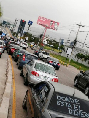 '¿Dónde está el dinero?': hondureños remarcan grafiti contra la corrupción (FOTOS)