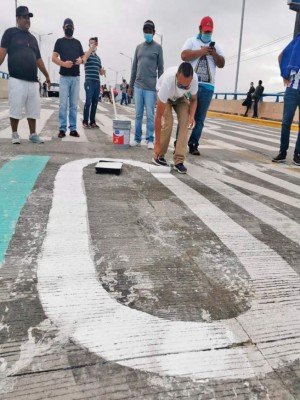 '¿Dónde está el dinero?': hondureños remarcan grafiti contra la corrupción (FOTOS)