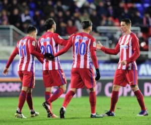 Los jugadores del Atlético de Madrid celebran una de las anotaciones (Foto: Agencia AFP)