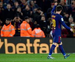 El delantero argentino del Barcelona Lionel Messi celebra un gol durante el partido de fútbol de la liga española entre el FC Barcelona y el Deportivo Alavés en el estadio Camp Nou de Barcelona el 28 de enero de 2018. / AFP / Josep LAGO