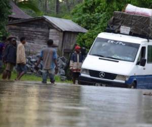 Madagascar, uno de los países más pobres del mundo, se ve afectado con regularidad por ciclones y otras tormentas tropicales que inundan las calles. Foto AP