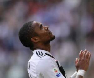 Douglas Costa fue suspendido por cuatro partidos de la Serie A. Foto: AFP