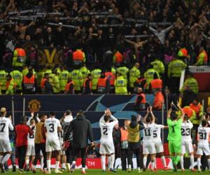 El equipo de Solskjaer fue insuficiente ante los embates del PSG que sacó petroleo del Teatro de los Sueños. Foto / AFP