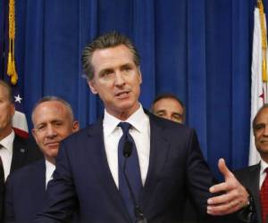 SACRAMENTO, CALIFORNIA - AUGUST 16: California Gov. Gavin Newsom speaks during a news conference with California attorney General Xavier Becerra at the California State Capitol on August 16, 2019 in Sacramento, California. California attorney genera Xavier Becerra and California Gov. Gavin Newsom announced that the State of California is suing the Trump administration challenging the legality of a new 'public charge' rule that would make it difficult for immigrants to obtain green cards who receive public assistance like food stamps and Medicaid. Justin Sullivan/Getty Images/AFP== FOR NEWSPAPERS, INTERNET, TELCOS & TELEVISION USE ONLY ==