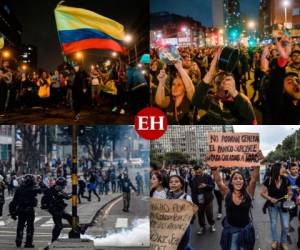 Algunos hacen caminatas maratónicas por la emblemática Carrera Séptima, que atraviesa Bogotá. Otros se unen a plantones o concentraciones. La mayoría de manifestantes pide diálogo directo ante la desconfianza que les genera la 'conversación nacional' convocada para este domingo por el presidente de Colombia, Iván Duque. Fotos: AFP.