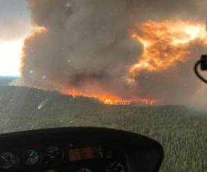 Un total de 677 incendios estaban activos el viernes (con 13 nuevos focos descubiertos en el día), y 386 sin control.