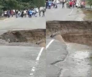 Las imágenes muestran parte de la carretera dañada este viernes en Ocotepeque.