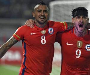 Los chilenos Arturo Vidal y Mauricio Pinilla