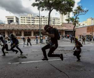 Sigue la crisis en Venezuela. La oposición salió a las calles pese a amenaza de prisión. (AFP)