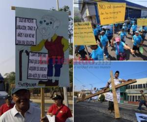 Los trabajadores llevaron pancartas con fuertes críticas hacia el gobierno, exigiendo mejores condiciones condiciones laborales. Foto: EL HERALDO