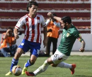 El plantel altiplánico recibió una inyección de ánimos, aunque casi sin chances para meterse en el pelotón de equipos que irán al próximo ecuménico de fútbol. Foto: AFP