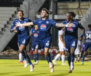 Imagen del argentino celebrando uno de sus goles con el Motagua.