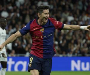 El polaco celebra uno de sus goles ante Real Madrid.