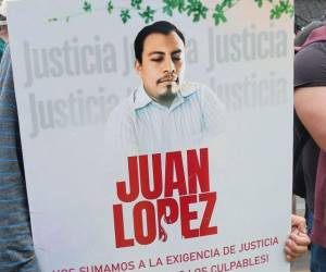 Manifestantes exigen justicia por el asesinato del ambientalista Juan López en Tocoa.