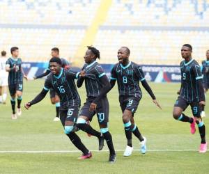 Los jugadores de la Selección de Honduras Sub-23 festejan el único gol anotado ante Estados Unidos.