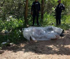 Los cuerpos de Favio Alejandro Rivera y José Geovanny Guardado Rivera fueron encontrados en una calle de tierra en Quilíz, Catacamas.