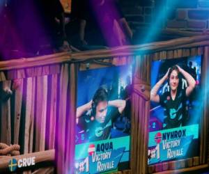 Emil 'Nyhrox' Bergquist Pedersen (R) and Thomas 'Aqua' Arnould react as they win a match during the Duos competition at the 2019 Fortnite World Cup July 27, 2019 inside of Arthur Ashe Stadium, in New York City. (Photo by Johannes EISELE / AFP)