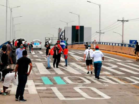 '¿Dónde está el dinero?': hondureños remarcan grafiti contra la corrupción (FOTOS)