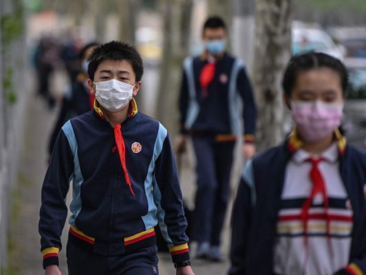 FOTOS: Bajo máxima seguridad, China regresa a clases