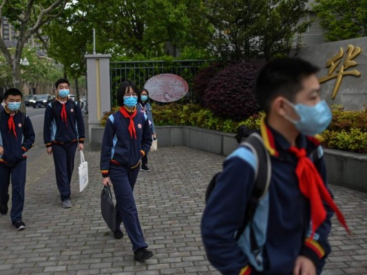 FOTOS: Bajo máxima seguridad, China regresa a clases