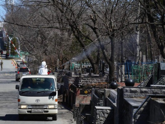 FOTOS: El coronavirus pone a prueba a los cementerios de Nueva York