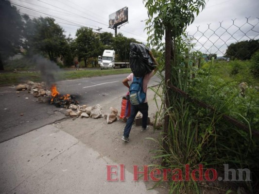 FOTOS: Segundo día de paro nacional deja enfrentamientos entre manifestantes y policías