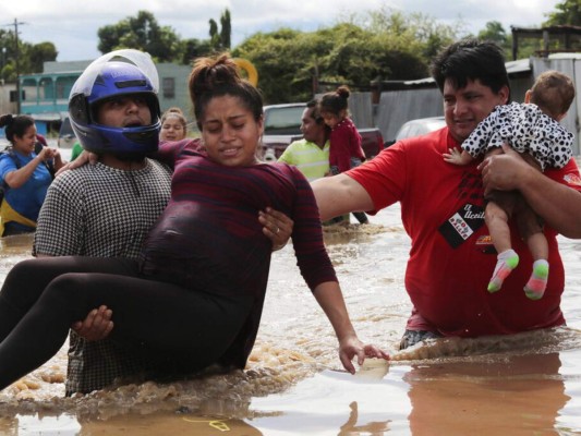 Los rostros de desesperación tras destructiva y mortal depresión Eta (FOTOS)