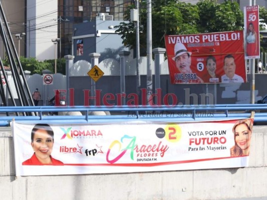 En muros, puentes y carreteras inicia la propaganda de movimientos políticos en la capital (FOTOS)