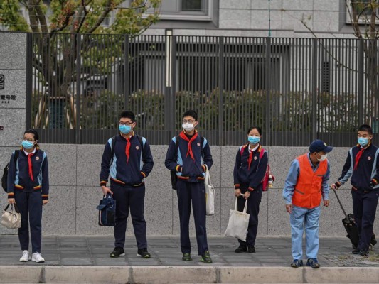 FOTOS: Bajo máxima seguridad, China regresa a clases