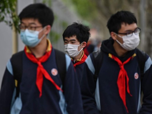 FOTOS: Bajo máxima seguridad, China regresa a clases