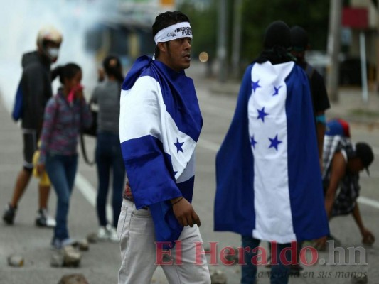 FOTOS: Segundo día de paro nacional deja enfrentamientos entre manifestantes y policías